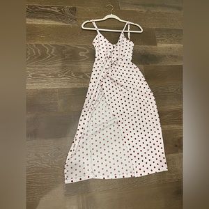 White dress with red polka dots & slit